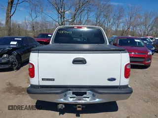 2003 Ford F-150 XLT with VIN 1FTRW07663KD57580, listed as a IAAI auction lot 41870643 with 256,497 mi miles. Bid and sale history available at carsss.com. Image 16.