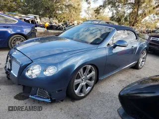 2013 Bentley Continental GT with VIN SCBGR3ZA0DC079677, listed as a Copart auction lot 82753764 with 58,406 mi miles and Salvage Title. Bid and sale history available at DreamBid. Image 1.