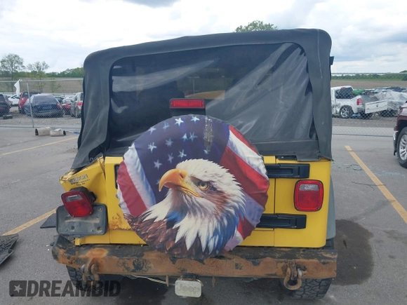 2005 Jeep Wrangler SE z VIN 1J4FA29S95P373313, wystawiony jako IAAI lot #42340611 z przebiegiem 162 801 mil mil oraz . Historia ofert i sprzedaży dostępna na DreamBid. Obrazek 16.