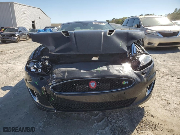 2015 Jaguar XK with VIN SAJWA4DCXFMB55227, listed as a Copart auction lot 48455465 with 64,050 mi miles and Salvage Title. Bid and sale history available at carsss.com. Image 5.