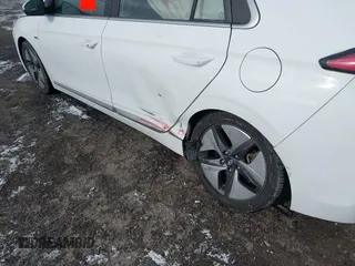 2020 Hyundai Ioniq SEL z VIN KMHC85LC4LU239732, wystawiony jako IAAI lot #41002757 z przebiegiem 76 379 mil mil oraz . Historia ofert i sprzedaży dostępna na DreamBid. Obrazek 6.