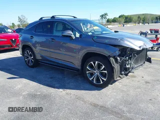 2018 Lexus RX 350 z VIN 2T2BZMCA2JC144288, wystawiony jako IAAI lot #41666033 z przebiegiem 76 637 mil mil oraz . Historia ofert i sprzedaży dostępna na DreamBid. Obrazek 1.