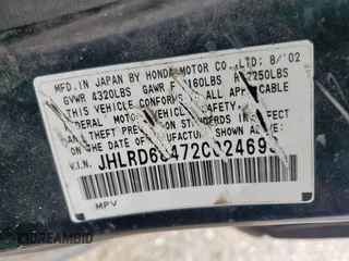 2002 Honda CR-V LX z VIN JHLRD68472C024693, wystawiony jako Copart lot #57076495 z przebiegiem 294 743 mil mil oraz Czysty tytuł • Clean title. Historia ofert i sprzedaży dostępna na DreamBid. Obrazek 13.