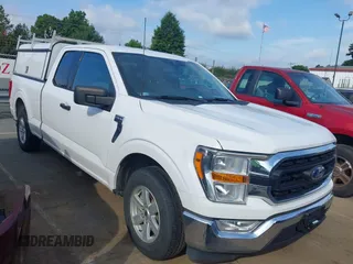 2021 Ford F-150 XL with VIN 1FTEX1C8XMKD86235, listed as a IAAI auction lot 42708713 with 122,630 mi miles and . Bid and sale history available at DreamBid. Image 1.