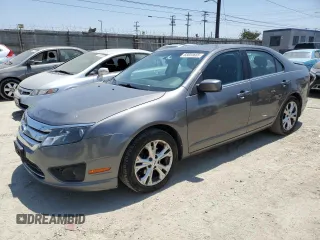 2012 Ford Fusion SE z VIN 3FAHP0HG7CR181740, wystawiony jako Copart lot #65853665 z przebiegiem 159 798 mil mil oraz Czysty tytuł • Clean title. Historia ofert i sprzedaży dostępna na DreamBid. Obrazek 1.