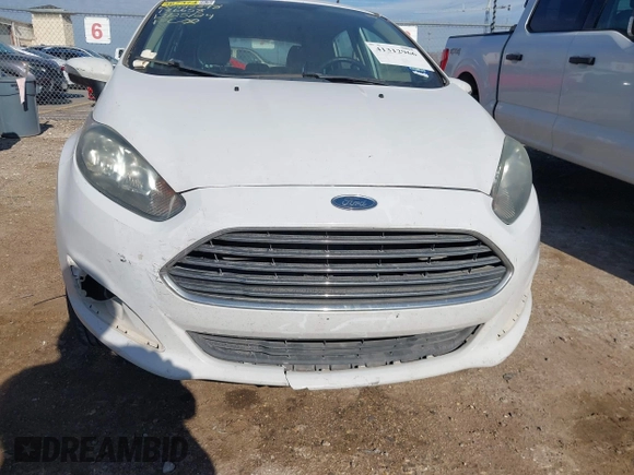 2016 Ford Fiesta SE z VIN 3FADP4EJ5GM136658, wystawiony jako IAAI lot #41312966 z przebiegiem 145 561 mil mil oraz . Historia ofert i sprzedaży dostępna na DreamBid. Obrazek 6.