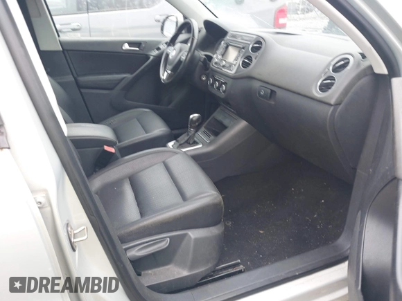 2012 Volkswagen Tiguan S z VIN WVGBV7AX3CW540311, wystawiony jako IAAI lot #42375250 z przebiegiem 168 594 mil mil oraz . Historia ofert i sprzedaży dostępna na DreamBid. Obrazek 5.