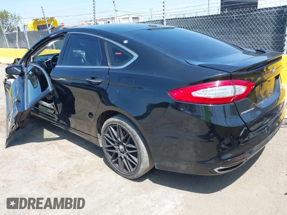 2016 Ford Fusion Titanium with VIN 3FA6P0K9XGR390364, listed as a IAAI auction lot 42165029 with 188,693 mi miles and . Bid and sale history available at DreamBid. Image 3.