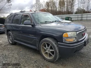 2004 GMC Yukon Denali with VIN 1GKEK63U64J132587, listed as a Copart auction lot 76592404 with 252,569 mi miles and Clean Title. Bid and sale history available at carsss.com. Image 4.