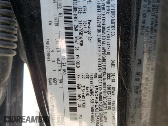 2018 Ford Focus SE z VIN 1FADP3FEXJL256542, wystawiony jako Copart lot #54583915 z przebiegiem 107 774 mil mil oraz Szkoda całkowita • Salvage title. Historia ofert i sprzedaży dostępna na DreamBid. Obrazek 13.