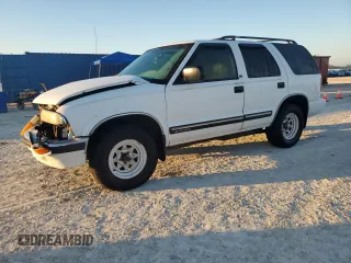 2001 Chevrolet Blazer LT z VIN 1GNCS13WX12223480, wystawiony jako Copart lot #82250894 z przebiegiem 189 924 mil mil oraz Szkoda całkowita • Salvage title. Historia ofert i sprzedaży dostępna na DreamBid. Obrazek 1.