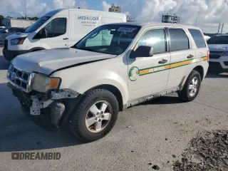 2010 Ford Escape XLS with VIN 1FMCU0C76AKB03306, listed as a Copart auction lot 64050625 with 88,225 mi miles and Salvage title. Bid and sale history available at DreamBid. Image 1.
