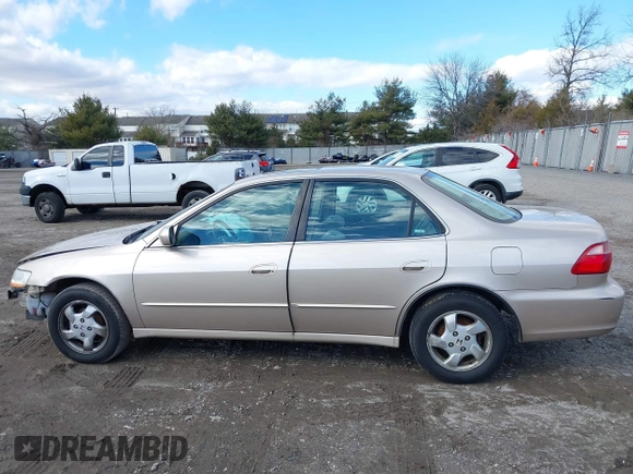 2000 Honda Accord EX z VIN 1HGCG6672YA069215, wystawiony jako IAAI lot #41508330 z przebiegiem 138 721 mil mil oraz . Historia ofert i sprzedaży dostępna na DreamBid. Obrazek 14.