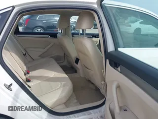 2014 Volkswagen Passat SE z VIN 1VWBN7A32EC003724, wystawiony jako IAAI lot #41890800 z przebiegiem 117 070 mil mil oraz . Historia ofert i sprzedaży dostępna na DreamBid. Obrazek 8.