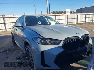 2024 BMW X6 xDrive40i with VIN 5UX33EX02R9T41673, listed as a IAAI auction lot 41427201 with 14,266 mi miles. Bid and sale history available at carsss.com. Image 1.