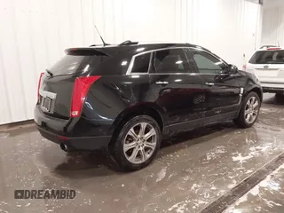 2012 Cadillac SRX Performance Collection z VIN 3GYFNBE30CS628660, wystawiony jako IAAI lot #42341993 z przebiegiem 249 922 mil mil oraz . Historia ofert i sprzedaży dostępna na DreamBid. Obrazek 4.
