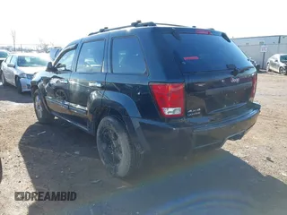 2008 Jeep Grand Cherokee Laredo with VIN 1J8GR48K98C193110, listed as a IAAI auction lot 41833331 with 174,518 mi miles. Bid and sale history available at carsss.com. Image 3.