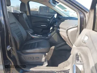 2015 Ford Escape Titanium with VIN 1FMCU0JX8FUC34459, listed as a IAAI auction lot 41394012 with 154,077 mi miles. Bid and sale history available at carsss.com. Image 5.
