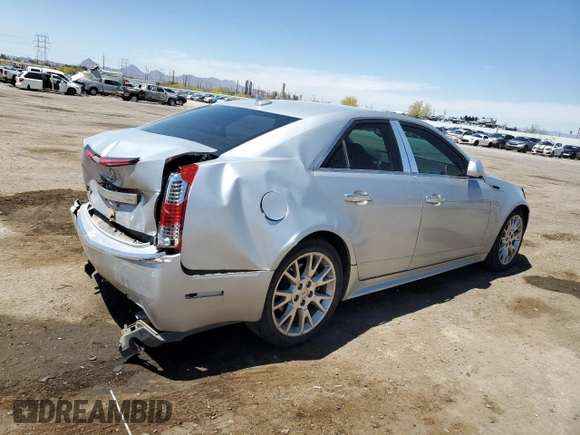 2012 Cadillac CTS Performance with VIN 1G6DK5E3XC0137143, listed as a Copart auction lot 53891815 with 123,174 mi miles and Salvage Title. Bid and sale history available at DreamBid. Image 3.