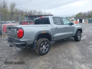 2024 GMC Canyon 4WD AT4 with VIN 1GTP6DEKXR1143138, listed as a IAAI auction lot 41952154 with 26,062 mi miles. Bid and sale history available at carsss.com. Image 4.