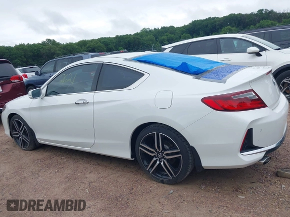2016 Honda Accord Touring with VIN 1HGCT2B09GA007614, listed as a IAAI auction lot 42532621 with 200,935 mi miles and . Bid and sale history available at DreamBid. Image 14.
