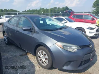 2014 Toyota Corolla L z VIN 2T1BURHE6EC135921, wystawiony jako IAAI lot #42689596 z przebiegiem 129 401 mil mil oraz . Historia ofert i sprzedaży dostępna na DreamBid. Obrazek 1.