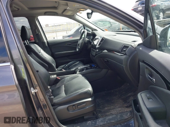 2017 Honda Pilot Touring with VIN 5FNYF6H92HB036406, listed as a IAAI auction lot 41949223 with 147,462 mi miles. Bid and sale history available at carsss.com. Image 5.