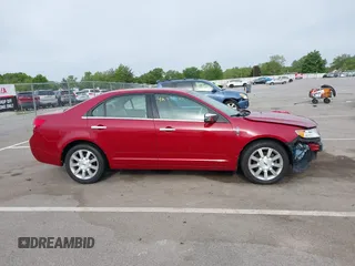 2010 Lincoln MKZ z VIN 3LNHL2GC2AR636552, wystawiony jako IAAI lot #42330172 z przebiegiem 98 883 mil mil oraz . Historia ofert i sprzedaży dostępna na DreamBid. Obrazek 14.