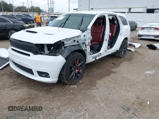 2018 Dodge Durango SRT with VIN 1C4SDJGJ4JC341550, listed as a IAAI auction lot 41525295 with 86,503 mi miles and . Bid and sale history available at DreamBid. Image 20.