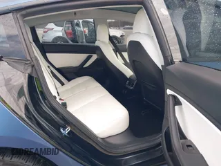 2018 Tesla Model 3 Long Range Battery with VIN 5YJ3E1EB9JF134958, listed as a IAAI auction lot 41980958 with 80,367 mi miles and . Bid and sale history available at DreamBid. Image 8.