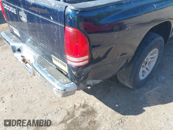 2001 Dodge Dakota Sport with VIN 1B7GL22N51S154848, listed as a IAAI auction lot 41941697 with 195,002 mi miles. Bid and sale history available at carsss.com. Image 6.