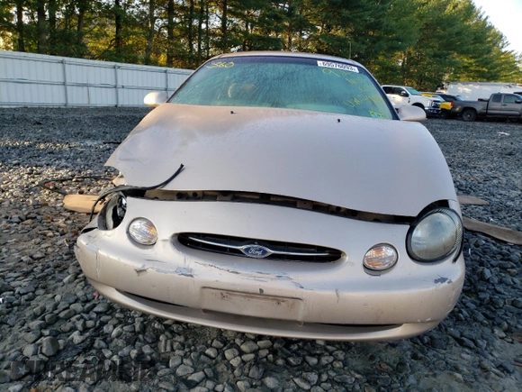 1999 Ford Taurus SE z VIN 1FAFP53U9XG107489, wystawiony jako Copart lot #69576093 z przebiegiem 86 262 mil mil oraz Szkody całkowita. Historia ofert i sprzedaży dostępna na DreamBid. Obrazek 5.