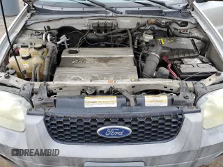 2005 Ford Escape Hybrid with VIN 1FMCU96H55KC74059, listed as a Copart auction lot 57065685 with 154,807 mi miles and Salvage title. Bid and sale history available at DreamBid. Image 12.