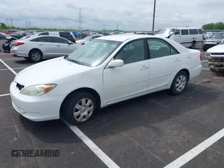 2004 Toyota Camry LE with VIN 4T1BE32K64U277496, listed as a IAAI auction lot 42130199 with 250,972 mi miles. Bid and sale history available at carsss.com. Image 2.