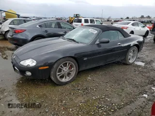 2002 Jaguar XK with VIN SAJDA42C12NA23956, listed as a Copart auction lot 45432365 with 84,827 mi miles and Clean Title. Bid and sale history available at DreamBid. Image 1.