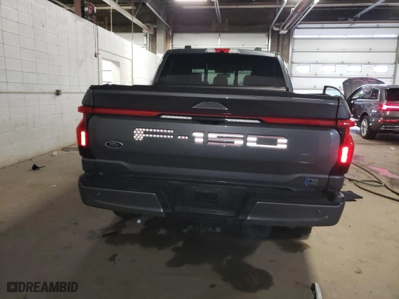 2022 Ford F-150 Lightning Pro with VIN 1FT6W1EV7NWG10033, listed as a Copart auction lot 81516533 with 11,282 mi miles and Salvage Title. Bid and sale history available at carsss.com. Image 6.