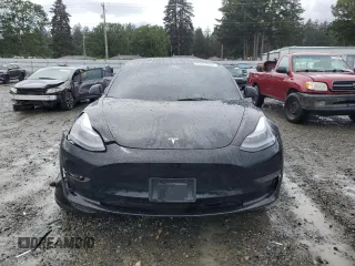 2023 Tesla Model 3 with VIN 5YJ3E1EA2PF457667, listed as a Copart auction lot 57360035 with 53,962 mi miles and Salvage title. Bid and sale history available at DreamBid. Image 5.
