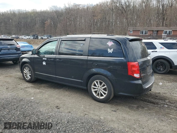 2018 Dodge Grand Caravan SXT with VIN 2C4RDGCG7JR307363, listed as a Copart auction lot 51110115 with 124,812 mi miles and Salvage Title. Bid and sale history available at DreamBid. Image 2.