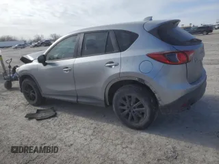 2015 Mazda CX-5 Touring with VIN JM3KE4CY4F0467571, listed as a Copart auction lot 88919035 with 197,755 mi miles and Salvage Title. Bid and sale history available at carsss.com. Image 2.