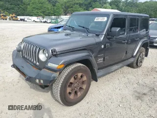 2018 Jeep Wrangler Unlimited Sahara с VIN 1C4HJXEGXJW272410, выставлен на аукционе Copart как лот 60811225 с пробегом 146 242 миль миль и Списание • Salvage title. История ставок и продаж доступна на DreamBid. Изображение 1.
