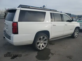 2015 Chevrolet Suburban LT with VIN 1GNSCJKC2FR601516, listed as a Copart auction lot 48480595 with 176,875 mi miles and Salvage title. Bid and sale history available at DreamBid. Image 3.