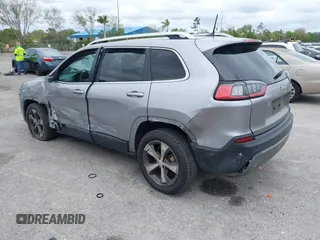 2020 Jeep Cherokee Limited with VIN 1C4PJLDB2LD560723, listed as a IAAI auction lot 41658092 with 73,978 mi miles. Bid and sale history available at carsss.com. Image 3.