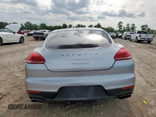 2014 Porsche Panamera с VIN WP0AA2A79EL009620, выставлен на аукционе Copart как лот 58654975 с пробегом 169 322 миль миль и Списание • Salvage title. История ставок и продаж доступна на DreamBid. Изображение 6.