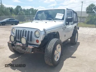 2009 Jeep Wrangler X with VIN 1J4FA24189L755392, listed as a IAAI auction lot 42176130 with 97,644 mi miles and . Bid and sale history available at DreamBid. Image 16.