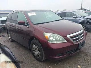 2007 Honda Odyssey EX-L z VIN 5FNRL38657B425749, wystawiony jako IAAI lot #42330245 z przebiegiem 191 093 mil mil oraz . Historia ofert i sprzedaży dostępna na DreamBid. Obrazek 1.