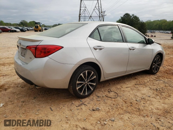 2019 Toyota Corolla L with VIN 5YFBURHE5KP910088, listed as a Copart auction lot 52401885 with 130,124 mi miles and Salvage Title. Bid and sale history available at DreamBid. Image 3.