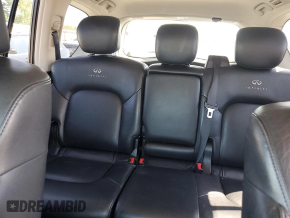 2012 Infiniti QX56 8-passenger with VIN JN8AZ2ND2C9716291, listed as a Copart auction lot 71990704 with 79,241 mi miles and Salvage Title. Bid and sale history available at carsss.com. Image 10.