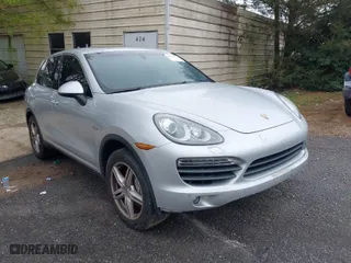 2012 Porsche Cayenne S Hybrid with VIN WP1AE2A2XCLA90082, listed as a IAAI auction lot 41960714 with 139,081 mi miles. Bid and sale history available at carsss.com. Image 1.
