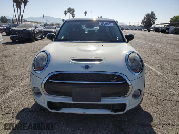 2017 MINI Hardtop 4 Door Cooper S z VIN WMWXU3C53H2D32509, wystawiony jako Copart lot #57886695 z przebiegiem 115 433 mil mil oraz Tytuł czysty. Historia ofert i sprzedaży dostępna na DreamBid. Obrazek 5.