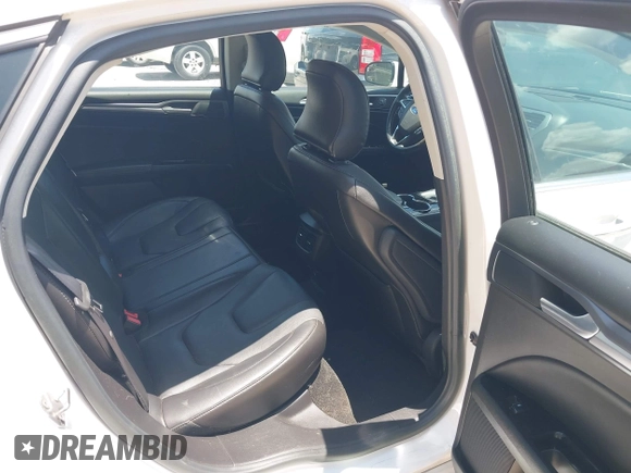 2016 Ford Fusion Titanium with VIN 3FA6P0SU5GR120687, listed as a IAAI auction lot 42571006 with 143,210 mi miles and . Bid and sale history available at DreamBid. Image 8.